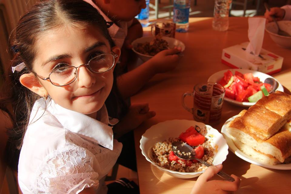 school feeding, school meal program in Armenia, young girl eating school lunch