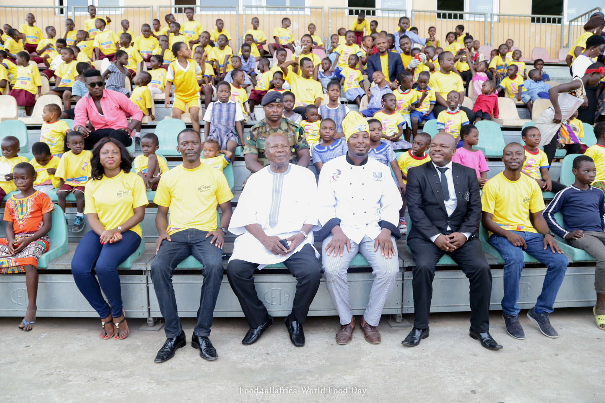 Dr. Kwame Amoako Tuffour (center left) and Elijah Amoo Addo (center right) at Food for All Africa’s Blue Band Nutrition4All Feast Day,